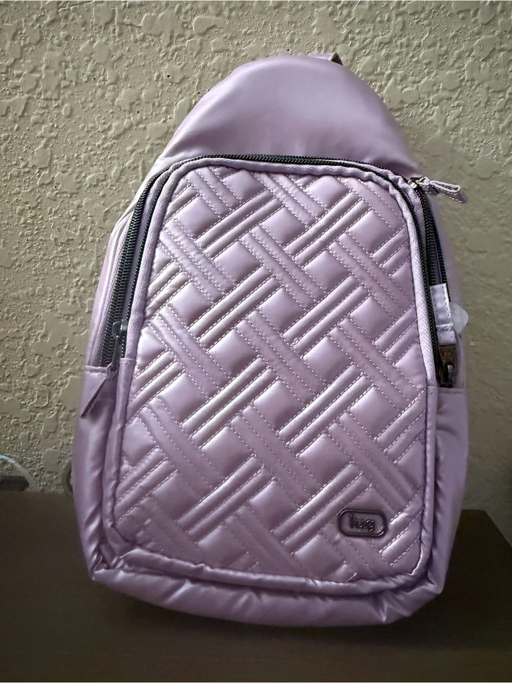 lug Quilted Sling Backpack in Light Pink Lavender